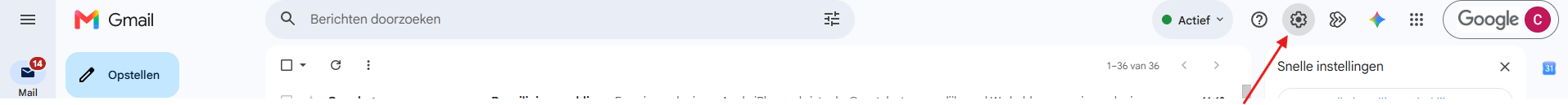 De bovenbalk van Gmail met een pijl naar het tandwiel-icoon rechtsboven